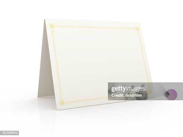 tented blank white card on a white surface - social grace stock pictures, royalty-free photos & images