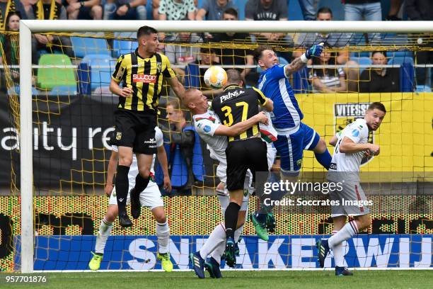 Tom Beugelsdijk of ADO Den Haag, Guram Kashia of Vitesse, Indy Groothuizen of ADO Den Haag during the Dutch Eredivisie match between Vitesse v ADO...