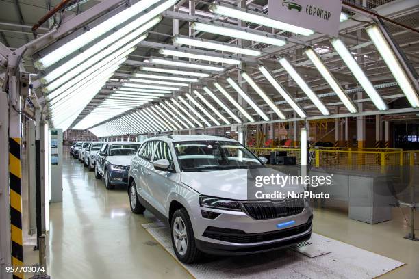 People at work in factory &quot;Eurocar&quot; near Uzhgorod, Ukraine, on May 11, 2018