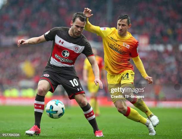 Christopher Buchtmann of St. Pauli and Steven Skrzybski of Berlin battle for the ball during the Second Bundesliga match between FC St. Pauli and...