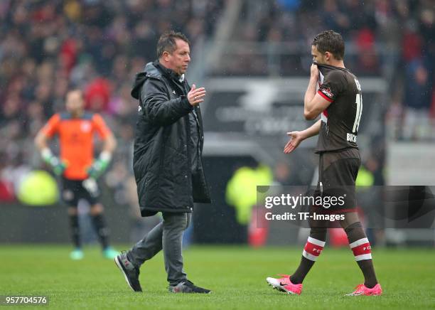 Head coach Markus Kauczinski of St. Pauli and Christopher Buchtmann of St. Pauli look dejected after the Second Bundesliga match between FC St. Pauli...