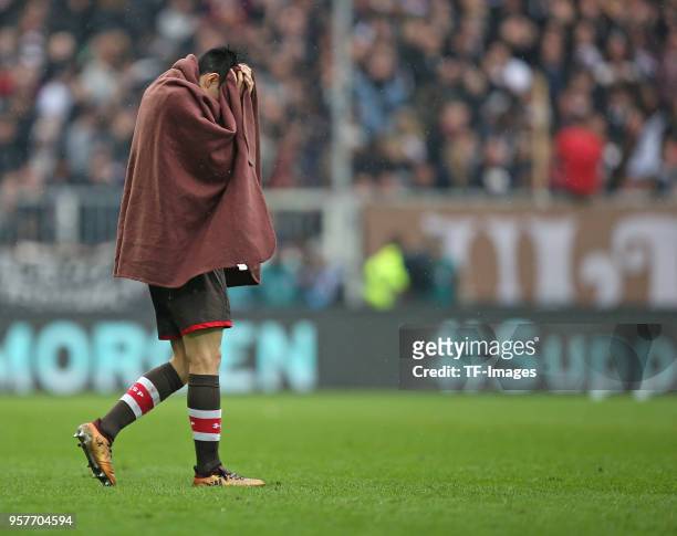 Yiyoung Park of St. Pauli looks dejected after the Second Bundesliga match between FC St. Pauli and Union Berlin at Millerntor Stadium on April 14,...