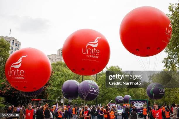 Demonstrators calling for fairer pay and rights for workers, as well as against public service cuts and workplace discrimination, gather on Victoria...