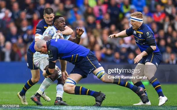Bilbao , Spain - 12 May 2018; Yannick Nyanga of Racing 92 is tackled by Devin Toner, front, and Jonathan Sexton of Leinster during the European Rugby...