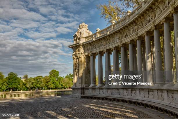 hemicycle ionic columns of the monument to alfonso xii in retiro park (madrid) - parque del buen retiro stock pictures, royalty-free photos & images