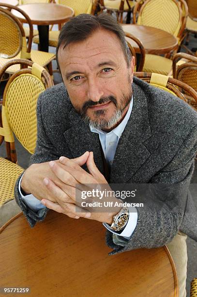 Spanish writer Arturo Perez Reverte poses during a Portrait Session held on May 13, 2004 in Paris, France.