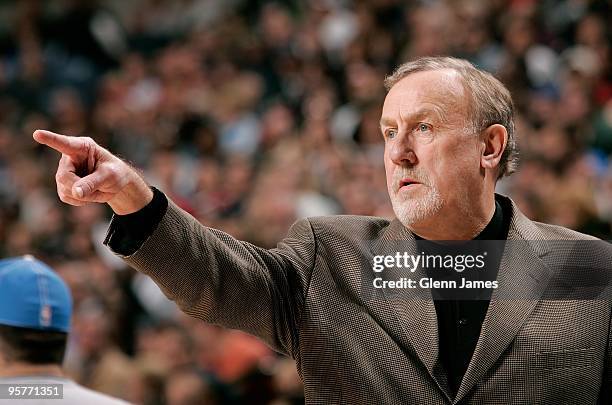 Head Coach Rick Adelman of the Houston Rockets watches from the sidelines during the game against the Dallas Mavericks on December 18, 2009 at...