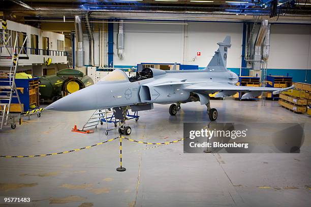 Saab Gripen fighter jet nearing completion stands at the company's factory in Linkoping, Sweden, on Wednesday, Jan. 13, 2010. Saab AB, the Swedish...