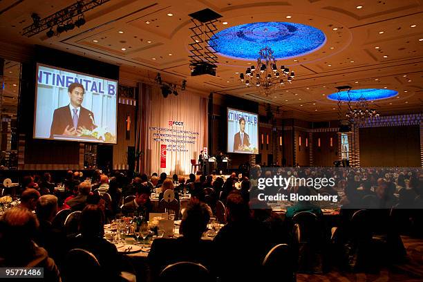 Abhisit Vejjajiva, Thailand's prime minister, speaks from the lectern at the Foreign Correspondents' Club of Thailand in Bangkok, Thailand, on...