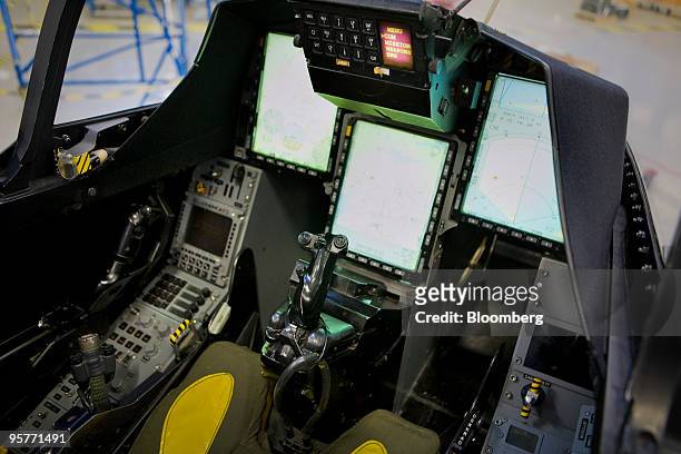 Scale model of the cockpit of a Saab Gripen fighter jet sits on display at the company's factory in Linkoping, Sweden, on Wednesday, Jan. 13, 2010....