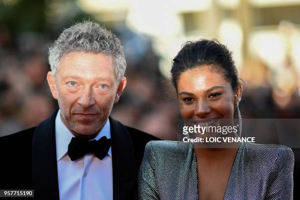French actor Vincent Cassel and his partner French model Tina Kunakey pose as they arrive on May 12, 2018 for the screening of the film "Girls of the...