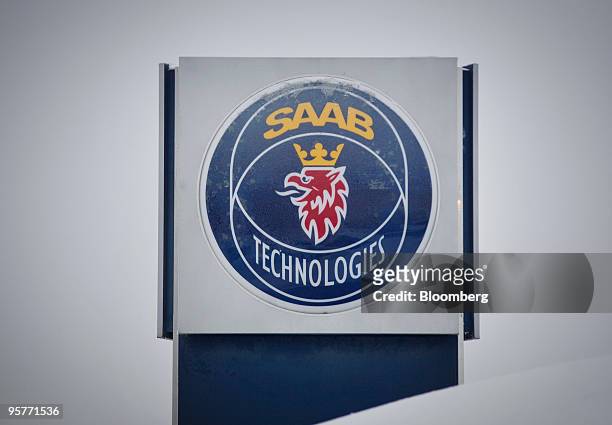 The Saab Technologies logo is displayed on a sign at the entrance to the Saab Gripen fighter factory in Linkoping, Sweden, on Wednesday, Jan. 13,...