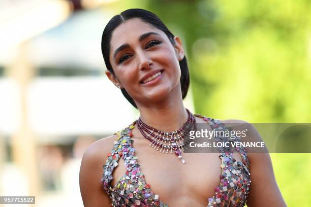 Iranian actress Golshifteh Farahani smiles as she arrives on May 12, 2018 for the screening of the film "Girls of the Sun " at the 71st edition of...
