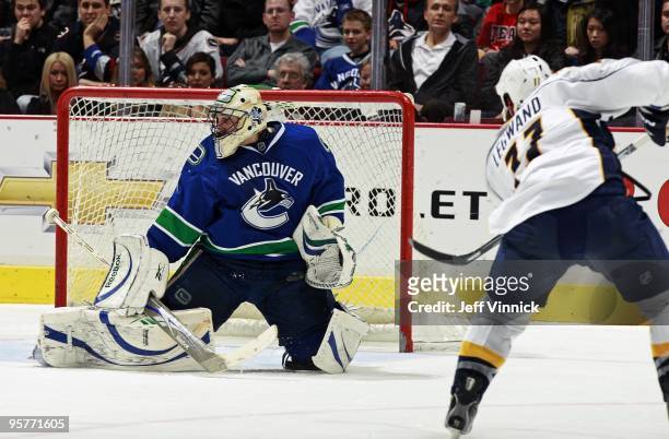 Roberto Luongo of the Vancouver Canucks makes a save off the shot of David Legwand of the Nashville Predators during their game at General Motors...