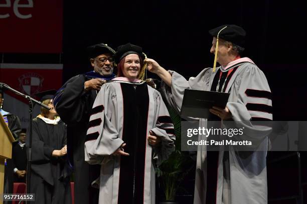 Rosanne Cash receives an Honorary Doctor of Music Degree at the Berklee College of Music Commencement day ceremony at Agganis Arena at Boston...