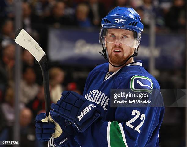 Henrik Sedin of the Vancouver Canucks looks to the bench during their game against the Nashville Predators at General Motors Place on January 11,...