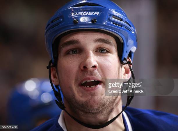 Shane O'Brien of the Vancouver Canucks looks on from the bench during their game against the Nashville Predators at General Motors Place on January...