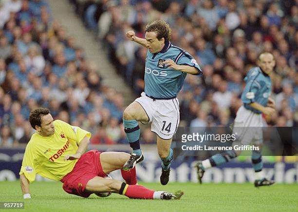 Eyal Berkovic of Manchester City has his route to goal blocked by Patrick Blondeau of Watford during the Nationwide League Division One match played...