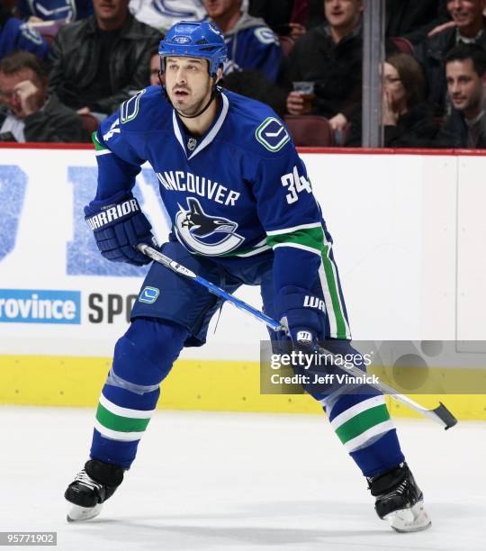 Brad Lukowich of the Vancouver Canucks looks to the bench during their game against the Nashville Predators at General Motors Place on January 11,...