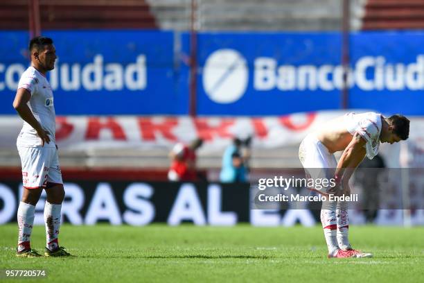 Andres Chavez and Ignacio Pussetto of Huracan react after the match between Huracan and Boca Juniors as part of Superliga 2017/18 at Estadio Tomas...