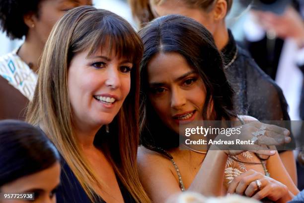 Patty Jenkins and Salma Hayek with other filmmakers on the steps of the red carpet in protest of the lack of female filmmakers honored throughout the...