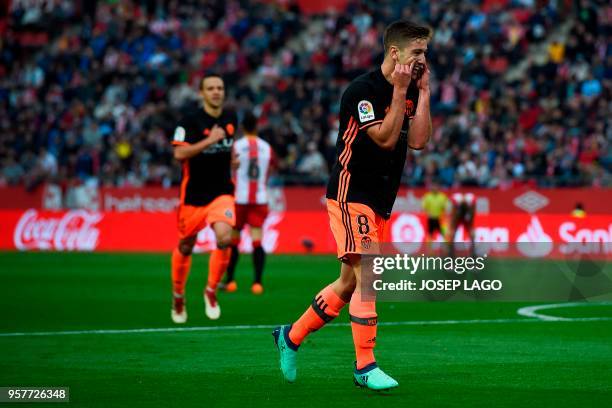 Valencia's Argentinian midfielder Luciano Vietto celebrates his goal during the Spanish league football match Girona FC vs Valencia CF at the...