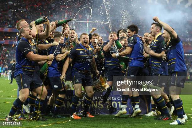 Leinster Rugby players celebrate with the European Rugby Champions Cup Trophy following the European Rugby Champions Cup Final match between Leinster...