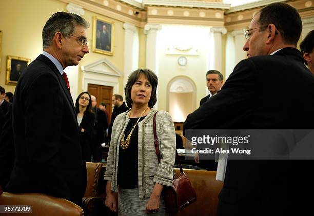 Commission Chairman Phil Angelides talks to Chairman of the Federal Deposit Insurance Corporation Sheila Bair and Assistant Attorney General Lanny...