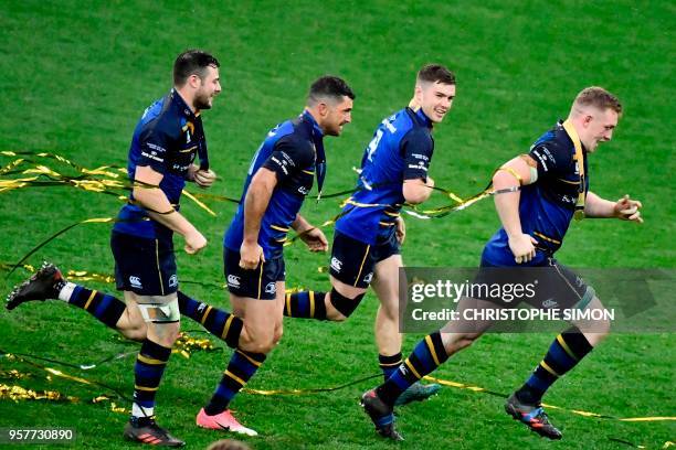 Leinster's players celebrate after the 2018 European Champions Cup final rugby union match between Racing 92 and Leinster at the San Mames Stadium in...