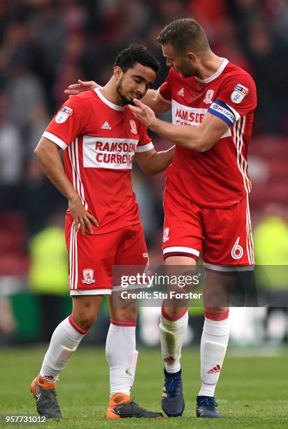 Ben Gibson of Middlesbrough consoles Fabio of Middlesbrough after the Sky Bet Championship Play Off Semi Final:First Leg match between Middlesbrough...