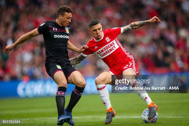 James Chester of Aston Villa and Muhamed Besic of Middlesbrough during the Sky Bet Championship Play Off Semi Final First Leg match between...