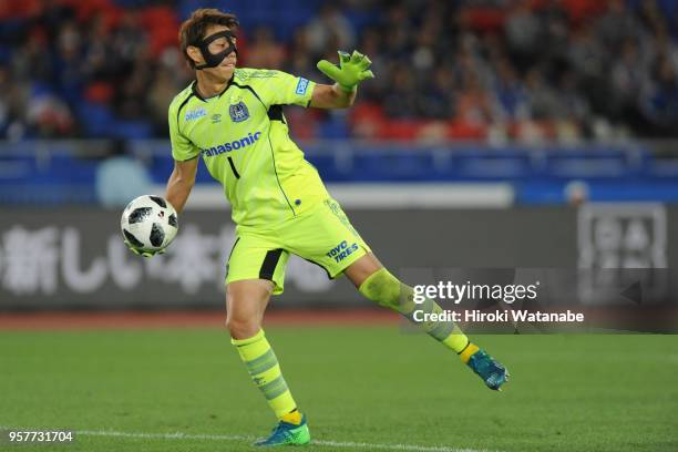 Masaaki Higashiguchi of Gamba Osaka in action during the J.League J1 match between Yokohama F.Marinos and Gamba Osaka at Nissan Stadium on May 12,...