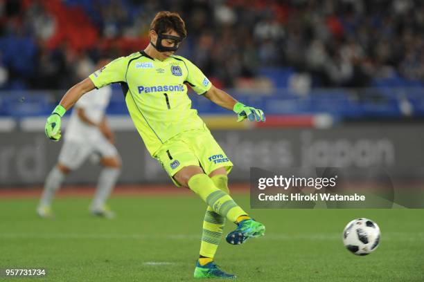 Masaaki Higashiguchi of Gamba Osaka in action during the J.League J1 match between Yokohama F.Marinos and Gamba Osaka at Nissan Stadium on May 12,...