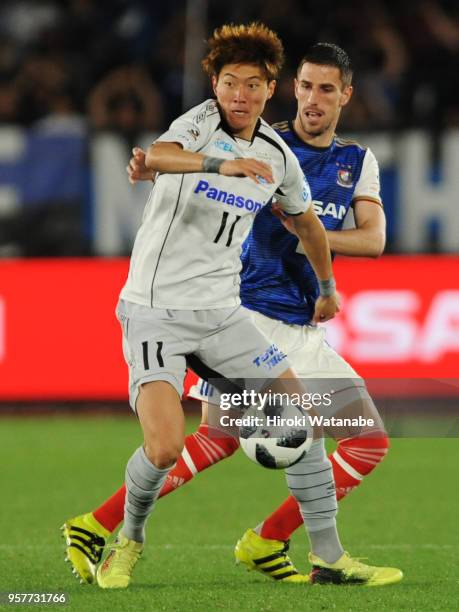 Hwang Ui Jo of Gamba Osaka in action during the J.League J1 match between Yokohama F.Marinos and Gamba Osaka at Nissan Stadium on May 12, 2018 in...