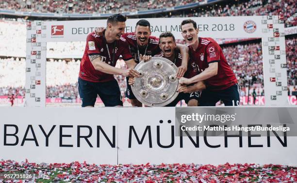 Niklas Suele of FC Bayern Muenchen, Sandro Wagner of FC Bayern Muenchen, Thomas Mueller of FC Bayern Muenchen and Sebastian Rudy of FC Bayern...