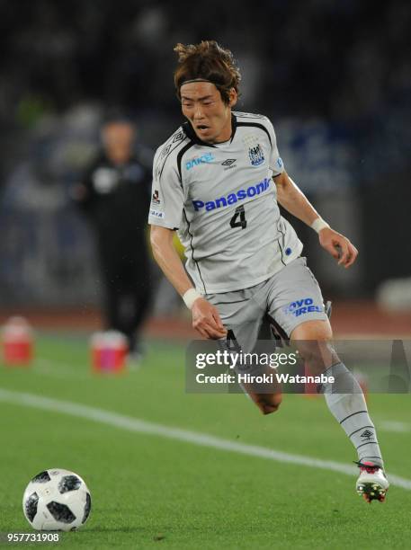 Hiroki Fujiharu of Gamba Osaka in action during the J.League J1 match between Yokohama F.Marinos and Gamba Osaka at Nissan Stadium on May 12, 2018 in...