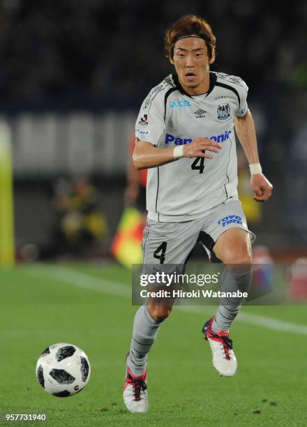 Hiroki Fujiharu of Gamba Osaka in action during the J.League J1 match between Yokohama F.Marinos and Gamba Osaka at Nissan Stadium on May 12, 2018 in...