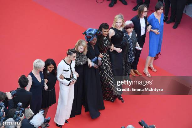 Haifaa al-Mansour, Kirsten Stewart, Lea Seydoux, Khadja Nin, Ava DuVernay, Cate Blanchett and Agnes Varda walk the red carpet in protest of the lack...