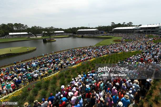 Crowds of fans on 17 during the third round of THE PLAYERS Championship on THE PLAYERS Stadium Course at TPC Sawgrass on May 12 in Ponte Vedra Beach,...