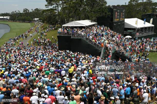 Crowds of fans on 17 and 18 during the third round of THE PLAYERS Championship on THE PLAYERS Stadium Course at TPC Sawgrass on May 12 in Ponte Vedra...