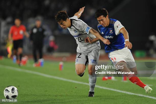 Oh Jae Suk of Gamba Osaka and Keita Endo of Yokohama F.Marinos compete for the ball during the J.League J1 match between Yokohama F.Marinos and Gamba...