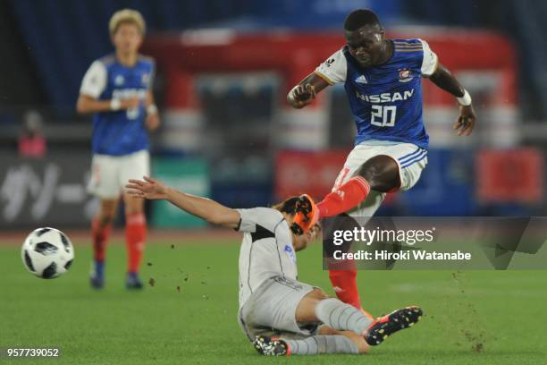 Yasuhito Endo of Gamba Osaka and Olivier Boumal of Yokohama F.Marinos compete for the ball during the J.League J1 match between Yokohama F.Marinos...