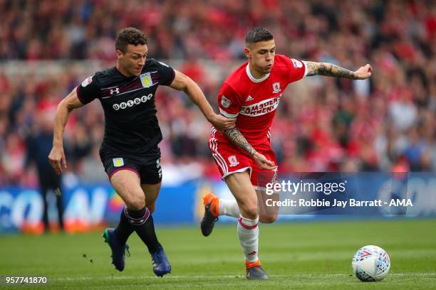 James Chester of Aston Villa and Muhamed Besic of Middlesbrough during the Sky Bet Championship Play Off Semi Final First Leg match between...