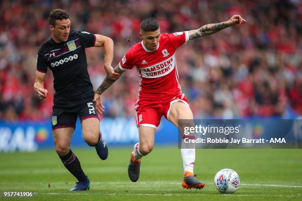 James Chester of Aston Villa and Muhamed Besic of Middlesbrough during the Sky Bet Championship Play Off Semi Final First Leg match between...