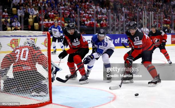 Bo Horvat of Canada and Veli Matti Savinainen of Finland during the 2018 IIHF Ice Hockey World Championship Group B game between Canada and Finland...