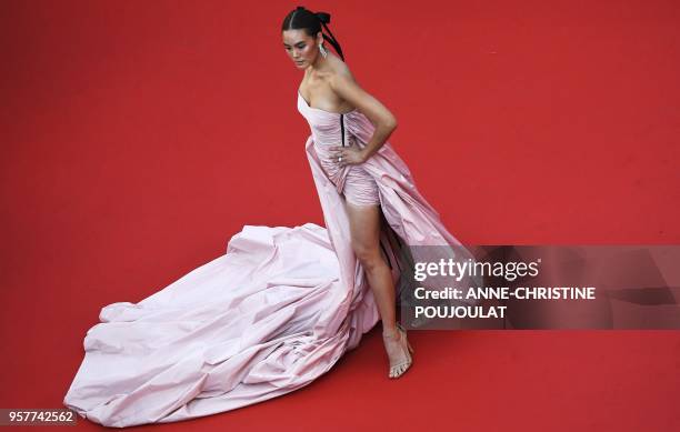 Thai actress Janie Tienphosuwan poses as she arrives on May 12, 2018 for the screening of the film "Girls of the Sun " at the 71st edition of the...