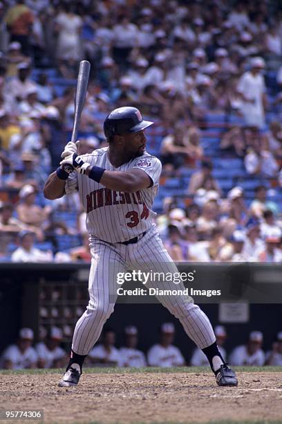 Outfielder Kirby Puckett of the Minnesota Twins awaits the next pitch during the top of the fifth inning of a game on July 17, 1988 against the...