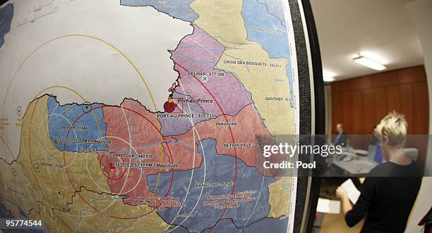 Map is seen showing the broadening of the earthquake in Haiti while the crisis management group meets at the Federal Foreign Office on January 14,...