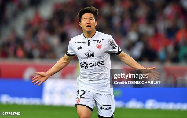 Dijon's South-Korean midfielder Chang Hoon Kwon celebrates after scoring during the French L1 football match between Lille OSC and Dijon at the...