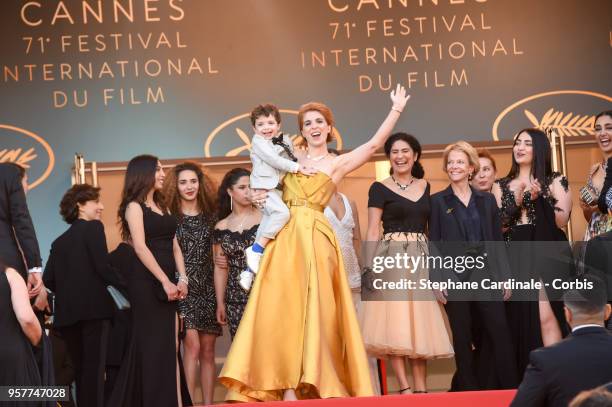 Eva Husson and kid attends the screening of "Girls Of The Sun " during the 71st annual Cannes Film Festival at Palais des Festivals on May 12, 2018...